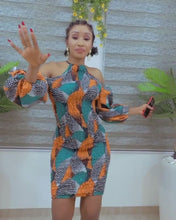 Load and play video in Gallery viewer, The Nana Stretchy Orange Ankara or Pagne Africaine Halter dress