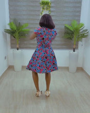 Load and play video in Gallery viewer, The Amara Pink and Blue Ankara or Pagne Africaine wrap dress