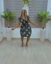 Load and play video in Gallery viewer, The Amara Green Ankara or Pagne Africaine wrap dress
