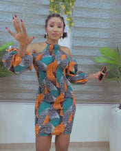 Load and play video in Gallery viewer, The Nana Stretchy Orange Ankara or Pagne Africaine Halter dress
